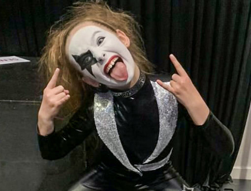 Molly Dunn, 9, preparing to dance with Kiss.