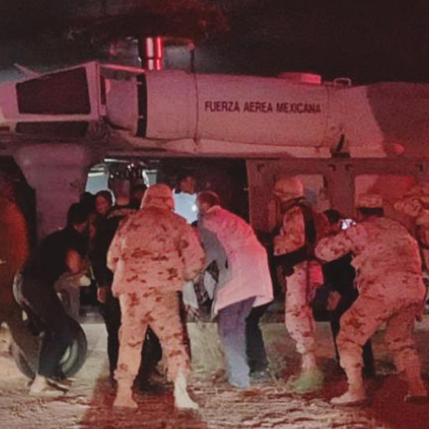 Children of the extended LeBaron family, who were injured in an ambush, are taken aboard a Mexican airforce helicopter to be flown to the Mexico-US border.