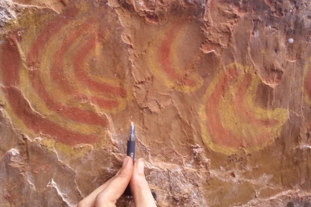 Researchers and traditional owners have saved the "spine-tingling" site from destruction by Rio Tinto.