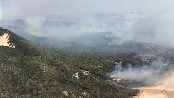 Firefighting efforts ramped up on Friday as the threat to infrastructure on the World Heritage-listed island grew.