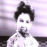 The first TV Vegemite girl, enjoying a snack.
