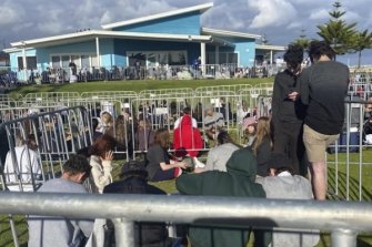 Leavers waited up to eight hours to get the wristband needed to enter official celebrations. 