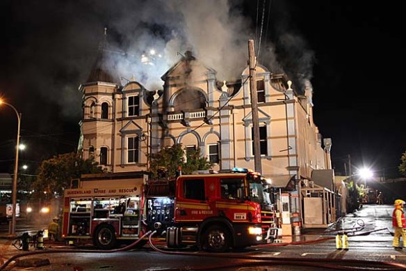 Flames and smoke engulf Woolloongabba's historic Broadway Hotel in 2017.