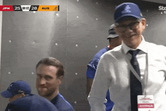 Les Kiss laughing in the Wallabies coaches box during the Japan Test.