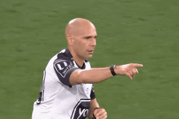 Harry Grant gets in referee Ashley Klein’s ear during Origin II.