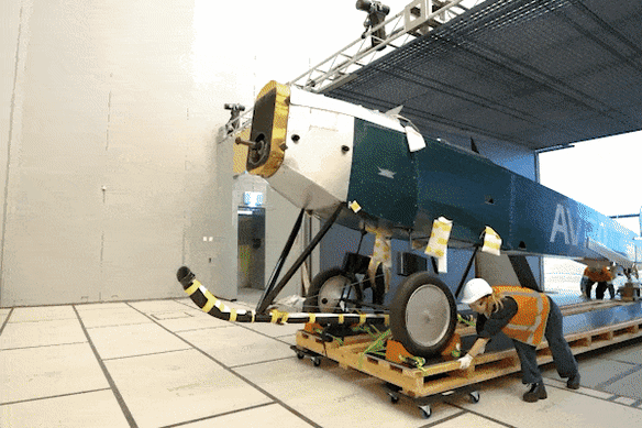 Installation of the Qantas planes at the Powerhouse Museum in Parramatta.