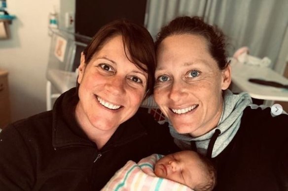 Sam Stosur with partner, Liz, and baby Genevieve.