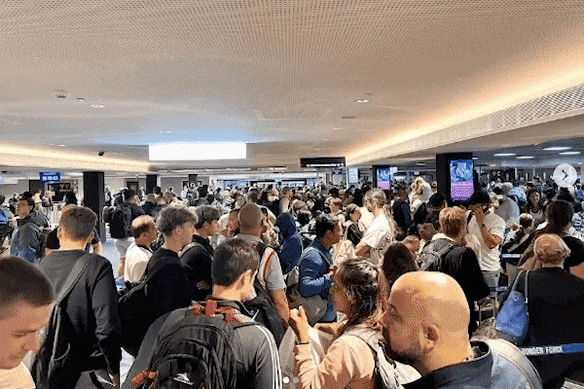 The system has caused airport queues in Sydney and Melbourne. 