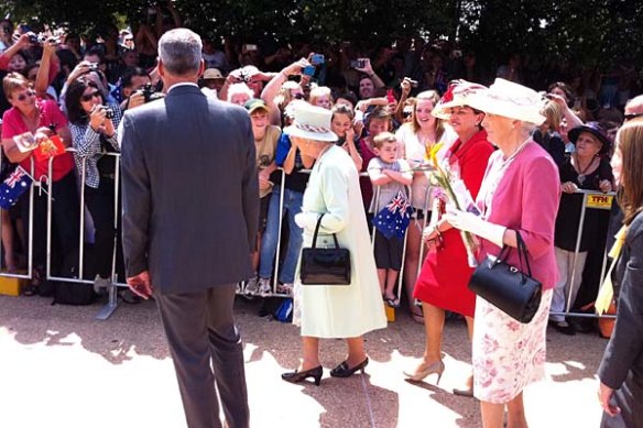 Premier Anna Bligh escorts Queen Elizabeth II along South Bank in 2011.