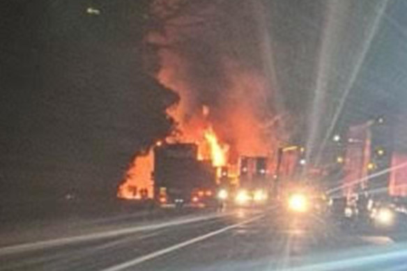 A witness photo of the fiery crash that killed a truck driver at the Victoria-South Australia border overnight.