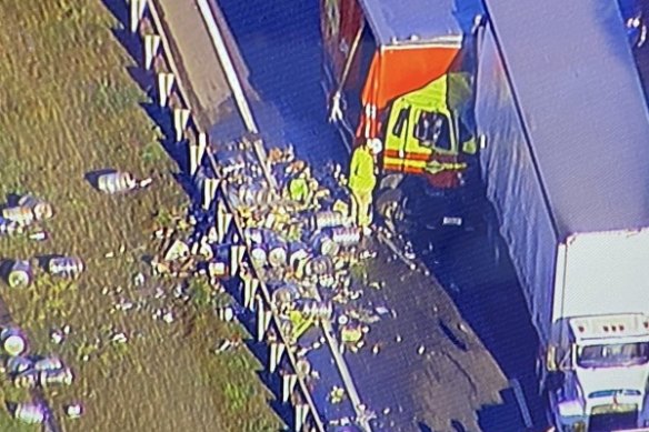 Beer kegs fell off a truck and were strewn over the Logan Motorway after a crash at Heathwood on Wednesday. 