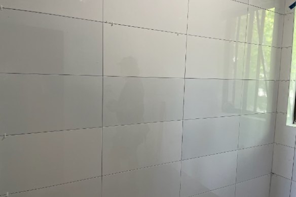 The tiler ordered tiles in two separate orders, resulting in differing colours.