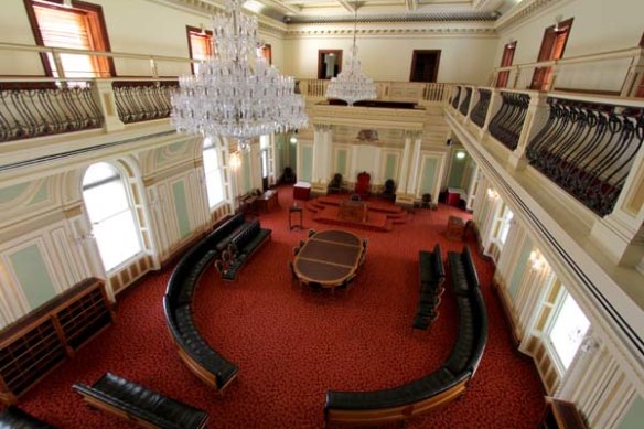 The former Legislative Council in Queensland Parliament, known as the Red Chamber, is now used for ceremonial or formal events.