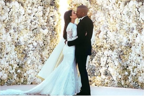Kim Kardashian and Kanye West on their wedding day in 2014.