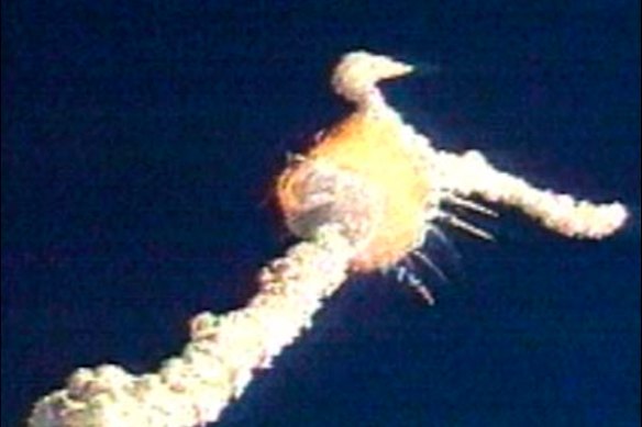 The Challenger space shuttle explodes on January 28, 1986.
