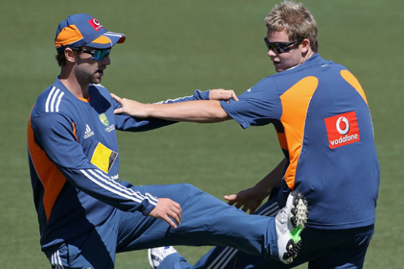 Phillip Hughes and Steve Smith warming up together.