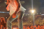 Morgan Wallen grabs phone and throws it into the audience mid-show. 