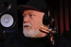 Kyle Sandilands was served with subpoena papers live on air by his manager, Bruno Bouchet. 