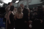 Actor David Corenswet got into a tense moment with a photographer at the Supergirl premiere in denfence of his co-star Milly Alcock.