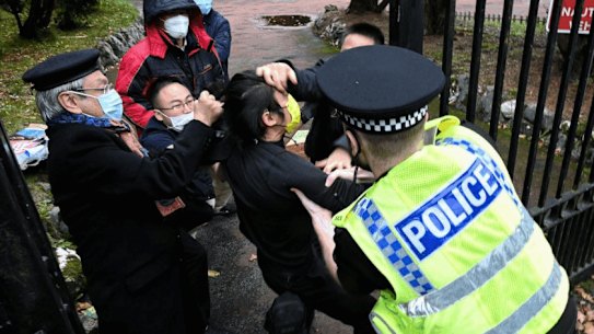 Hong Kong protester says he was ‘dragged’ into Chinese consulate in Manchester and beaten GIF