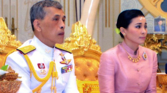 Thailand's King Maha Vajiralongkorn (left) sits with Queen Suthida Vajiralongkorn Na Ayutthaya in a photo released on Wednesday.