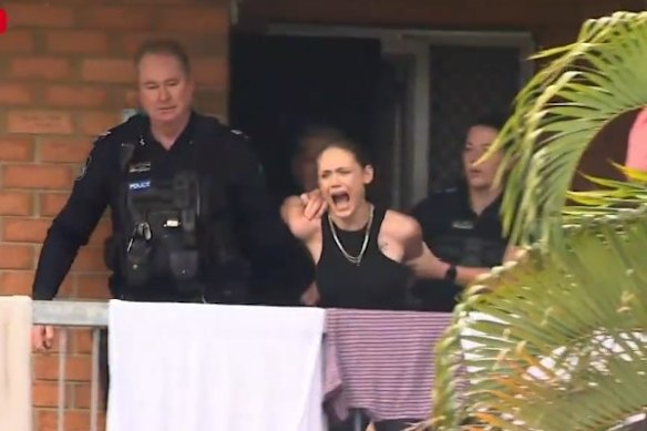 Layla Evans is arrested after her two dogs mauled a man at 7th Brigade Park in Chermside on October 16, 2026.