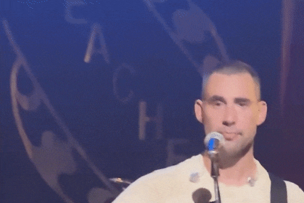 Jack Antonoff reacts to a fan request at a Bleachers show.