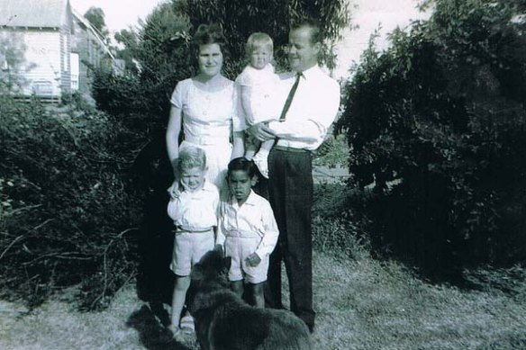 Russell Moore with his adoptive parents, Nesta and Graeme Savage.