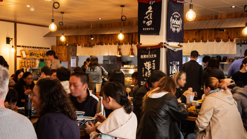 Cosy Hifumiya serves housemade Japanese udon noodles by day before transforming into a roaring izakaya at night