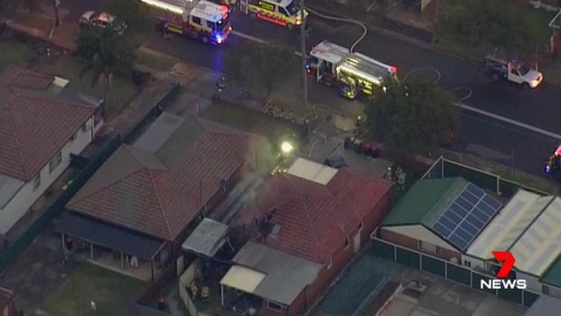 A man is in a critical condition after suffering burns to 40 per cent of his body in a Chester Hill house fire.