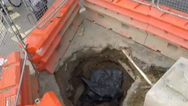 Construction workers have uncovered human remains, which will further delay the already-behind light rail project. 