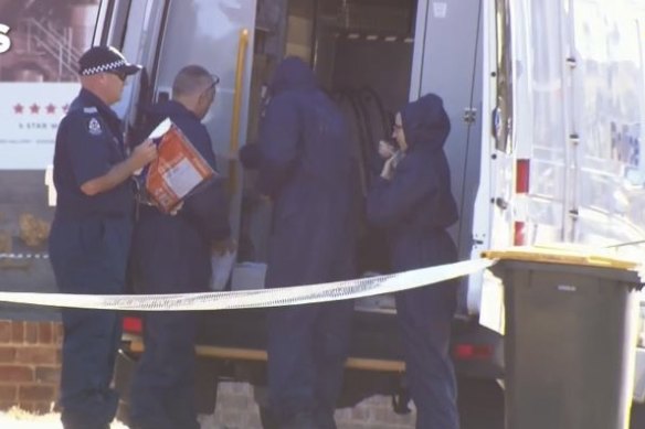 Forensic officers scour the Mount Lawley home. 