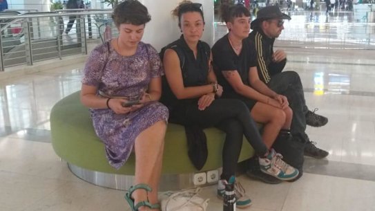The four Australians - Tom Baxter, 37, Cheryl Melinda Davidson, 36, Danielle Joy Hellyer, 31, and Ruth Irene Cobbold, 25 - who are being deported from Indonesia pictured at Makassar airport after they had left West Papua. 