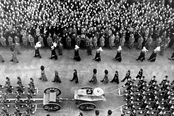 The coffin of King George VI passes through Picadilly on its way to Paddington Station en route to Windsor, in 1952.