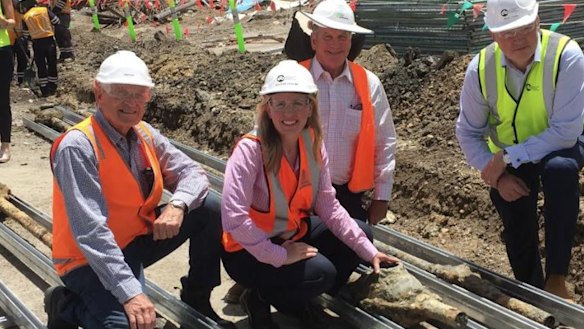 Tourism Industry minister Kate Jones with Destination Brisbane project director Simon Crooks (right) at the unearthing of the 134-year-old electrical cables.