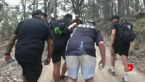 A screen grab from Channel Seven of Scott Morrison on a hike for the Clontarf Foundation, which helps improve the work and education prospects of young Indigenous men.