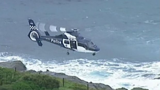 A search for a fisherman swept off the rocks at Phillip Island in September. 