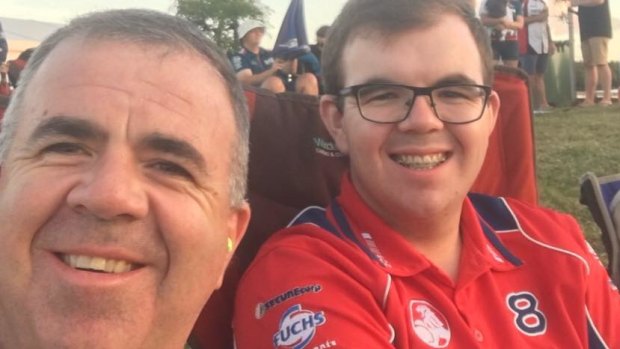 Dane Bracey (right) pictured with his father Darren (left). Dane drowned in a flooded north Queensland creek on Sunday.