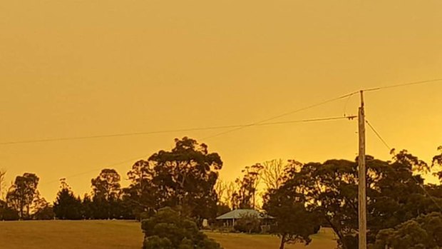 The sky has turned orange near Dargo as the bushfire flares up again. 