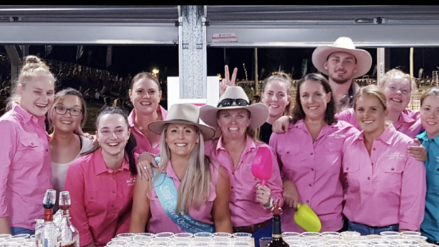 Acting Senior Constable Aimee Sewell (fifth from left) and her army raising funds for the Mount Isa PCYC.