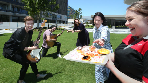 Performers Dee Bradley and Damien Johnson, Ipswich mayor Teresa Harding, deputy mayor Marnie Doyle and Dominiques Cafe's Abbey Luke gear up for the opening of Tulmur Place.
