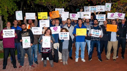 Members of the self-proclaimed Fish Army protest at the City of Cockburn over plans to build a container port near Kwinana.