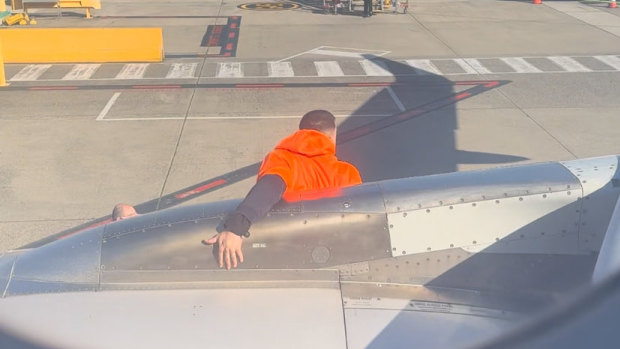 Emergency slide deployed after Jetstar passenger forced open emergency exit door