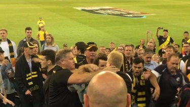 Footage showed a group of men involved in the brawl, while the Tigers club song plays in the background.