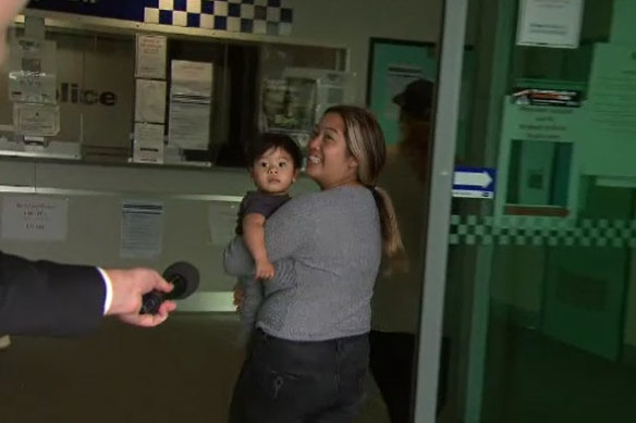 The baby boy and his mother are reunited at Cranbourne police station on Tuesday.