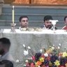 Clergy react during the incident in the Louisiana church.