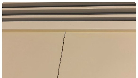 Walls are cracking in the partially completed residential skyscraper.