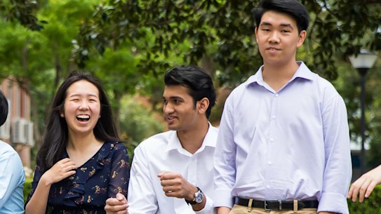 The seven James Ruse students who received an ATAR of 99.95, from left to right: Winston Huang (standing), Eric Huang;  Anthony Hwang; Sariena Ye; Dineth Fernando; Alexander Van Phan; Grace Li.