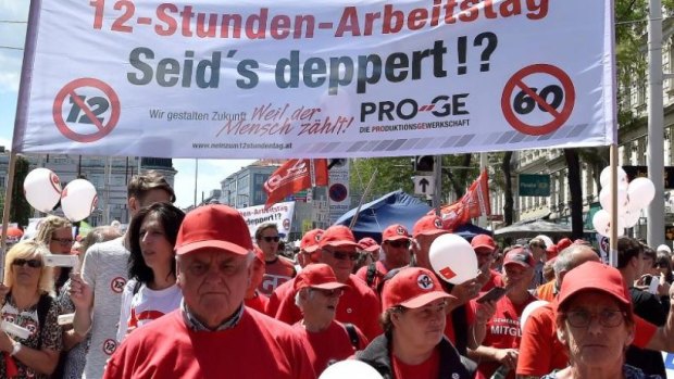 Protesters took to the  streets of Vienna to express opposition to the Austrian government's proposed labour laws that would legalise a working day of up to 12 hours.