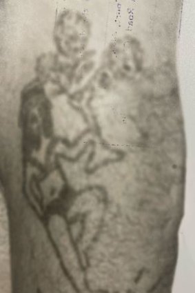 Tattoos could help identify the man.